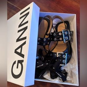 GANNI
Buckled eyelet-embellished recycled faux patent-leather ballet flats